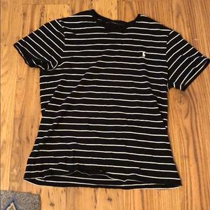 Polo , Black and White striped shirt.